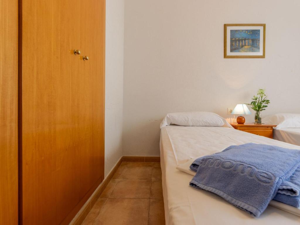 Posteľ alebo postele v izbe v ubytovaní Holiday Home Zona Estival-2 by Interhome