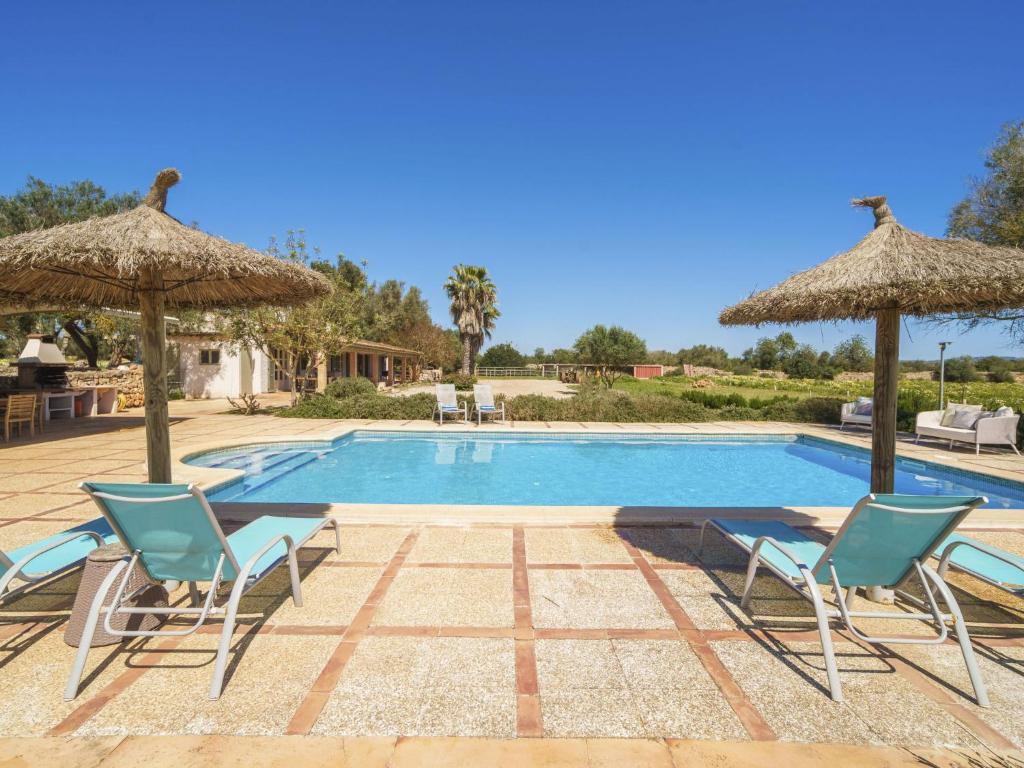The swimming pool at or close to Holiday Home Can Soler by Interhome