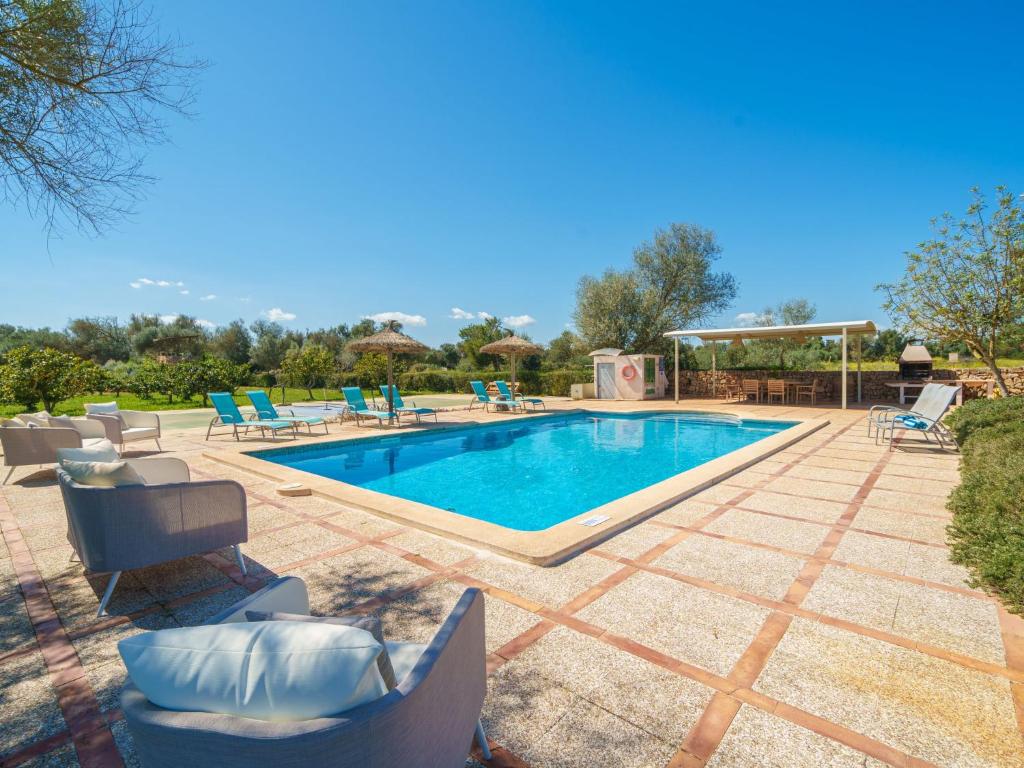 The swimming pool at or close to Holiday Home Can Soler by Interhome