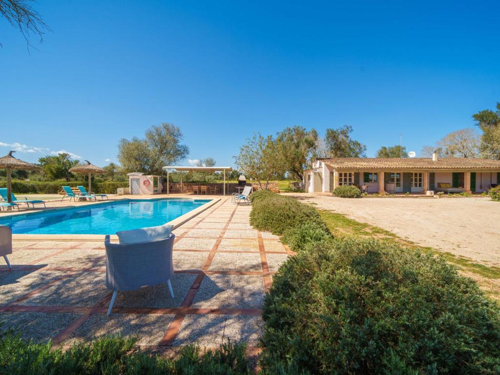 The swimming pool at or close to Holiday Home Can Soler by Interhome