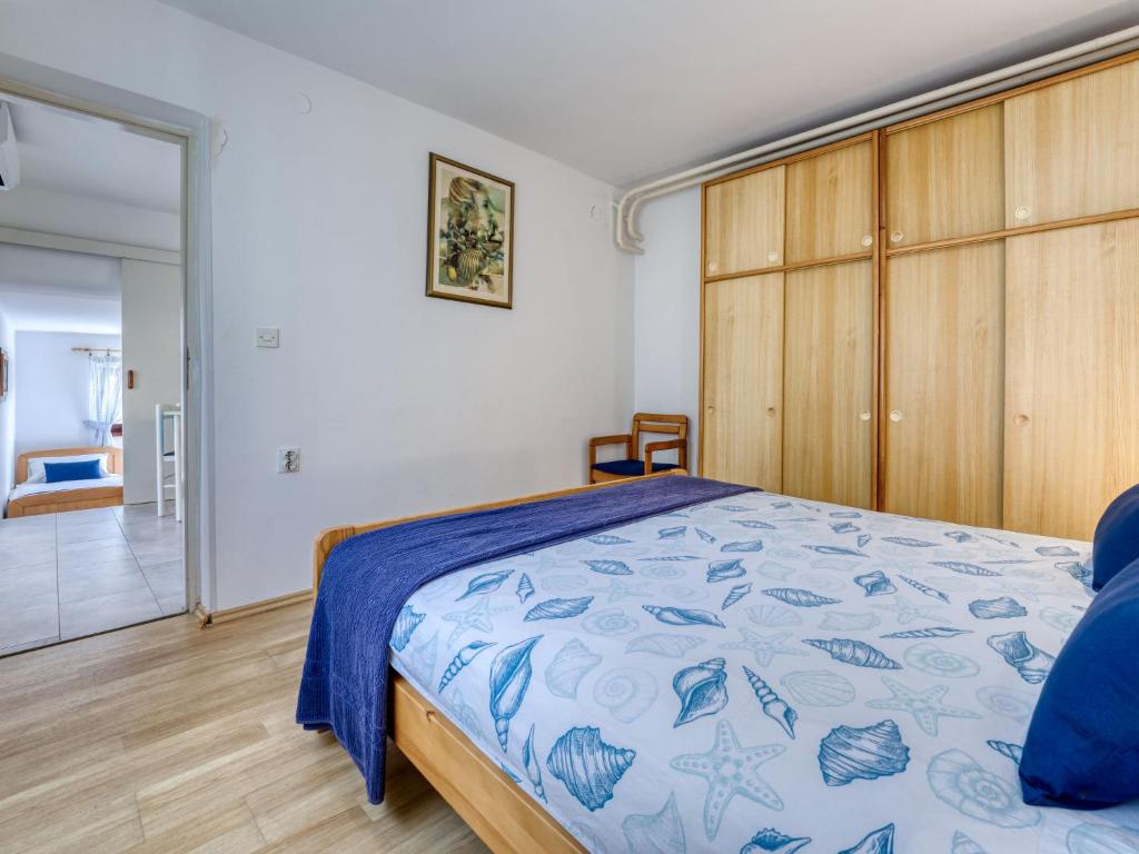 Postel nebo postele na pokoji v ubytování Apartment Jurkovic-1 by Interhome