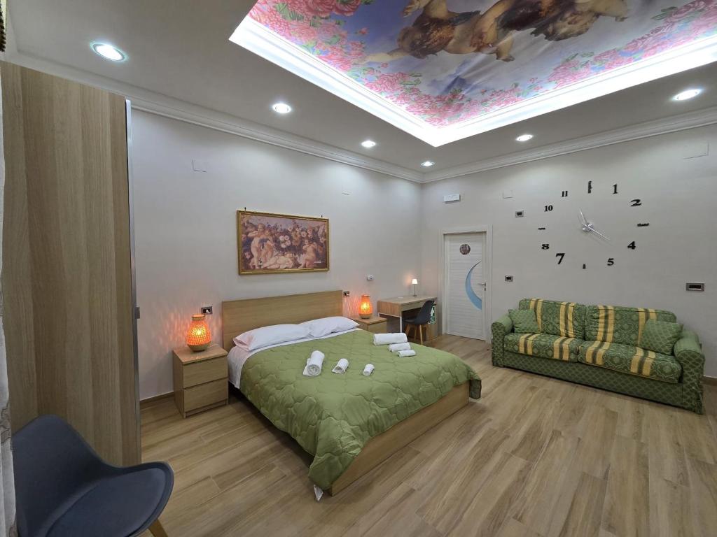 Ένα ή περισσότερα κρεβάτια σε δωμάτιο στο Maison de Ciro