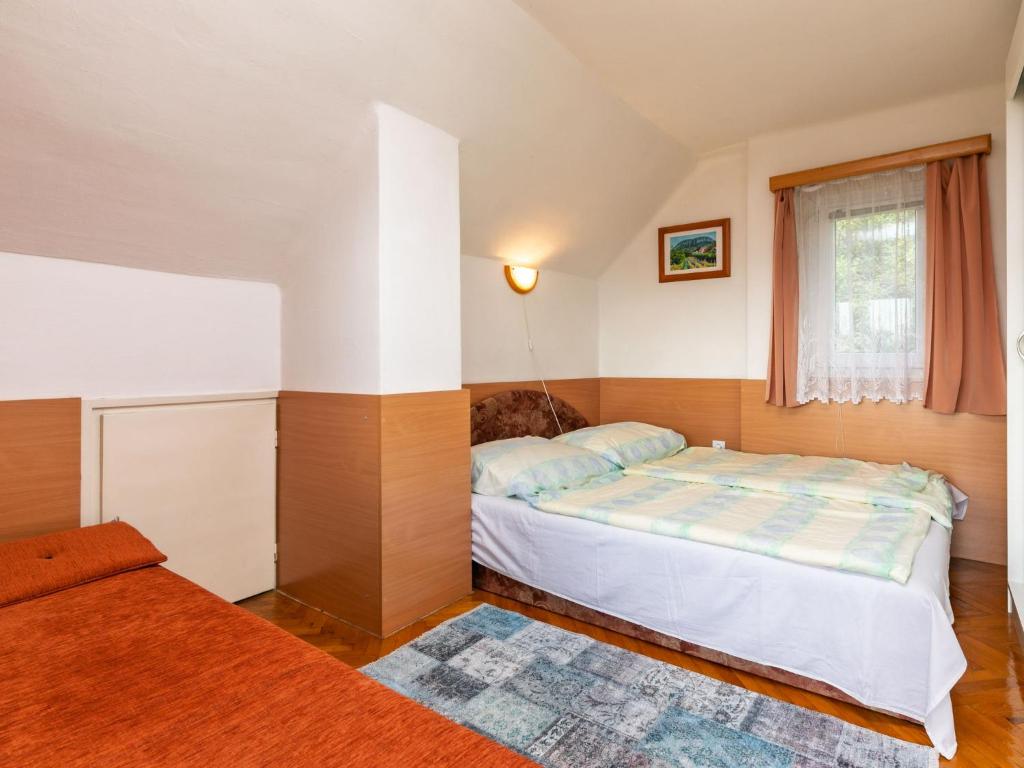 Postel nebo postele na pokoji v ubytování Holiday Home Kopacsi by Interhome