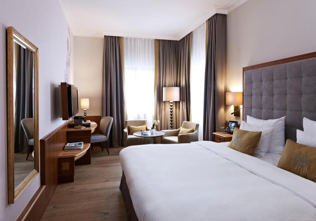 Postel nebo postele na pokoji v ubytování Platzl Hotel - Superior