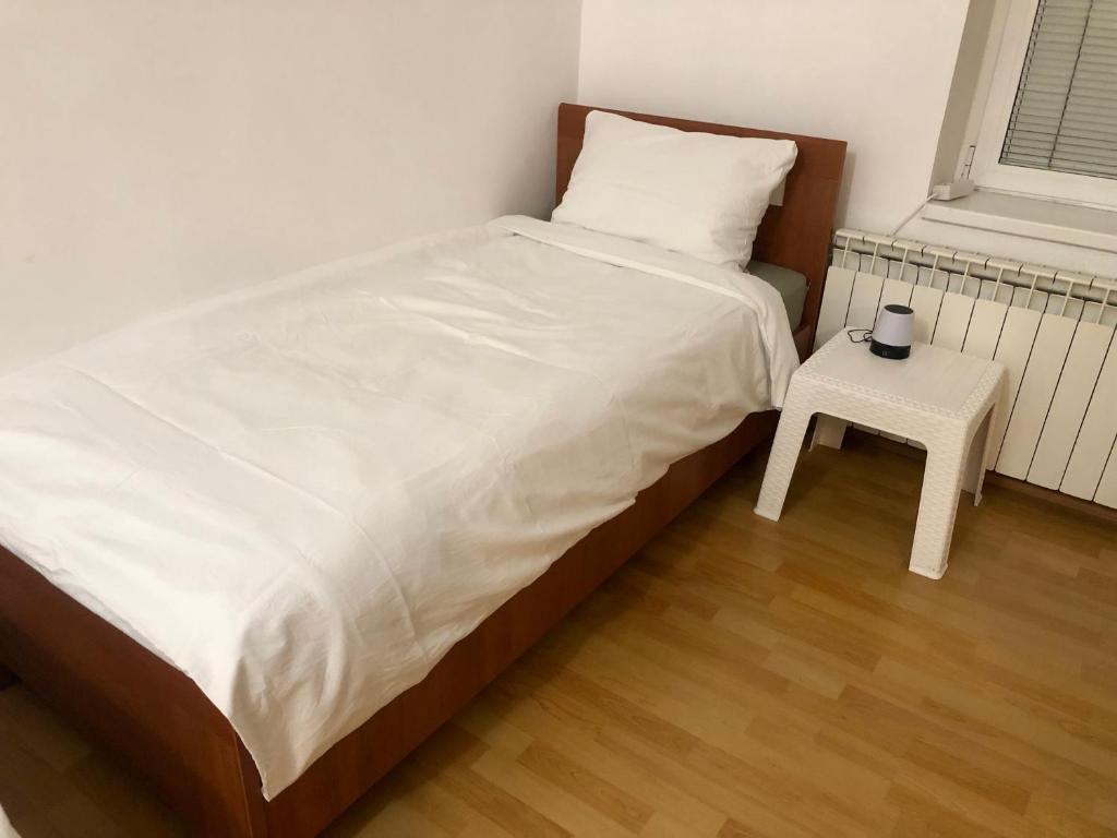 Postel nebo postele na pokoji v ubytování NK Apartment - Girls Only