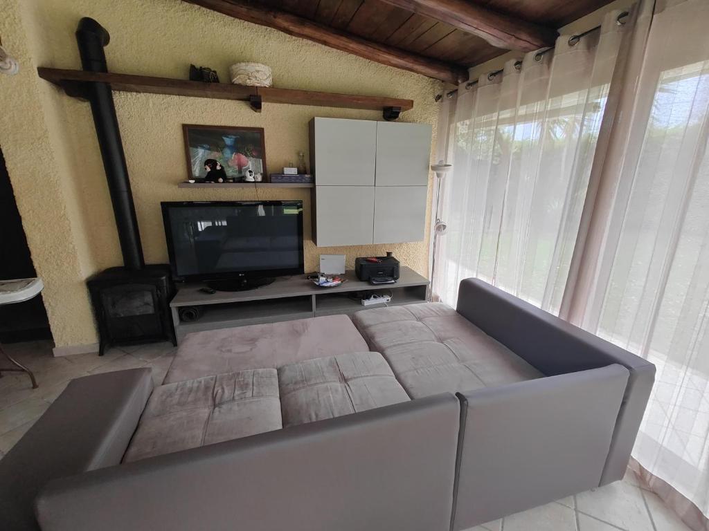TV a/nebo společenská místnost v ubytování Smarthome