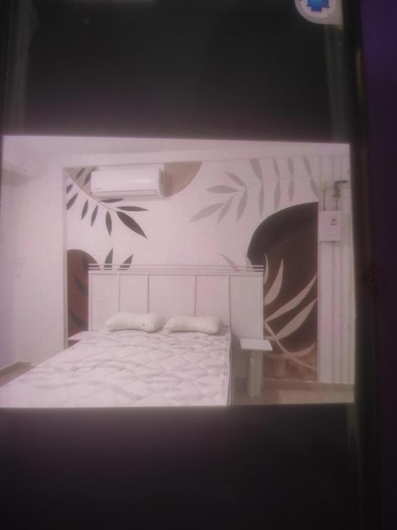 Postel nebo postele na pokoji v ubytování Bucaneros TownHouse Verde