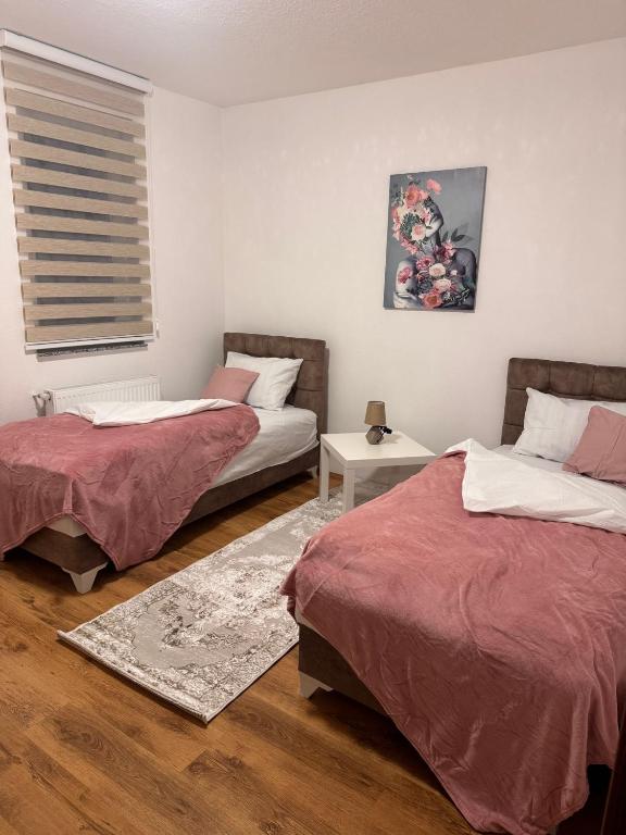 Postel nebo postele na pokoji v ubytování Pešterski kutak