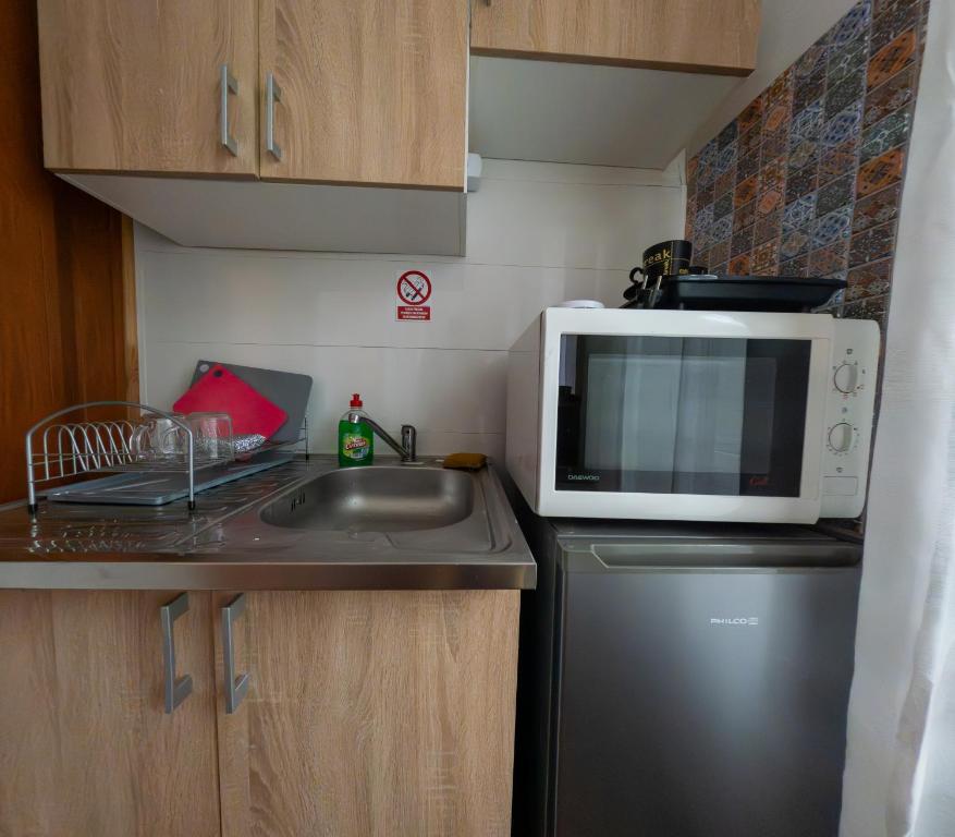 Kuchyňa alebo kuchynka v ubytovaní Loft w centrum Złotego Stoku