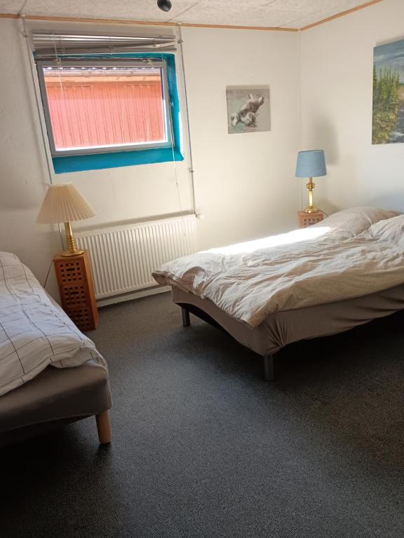 Postel nebo postele na pokoji v ubytování 70 m2 Anneks på gården