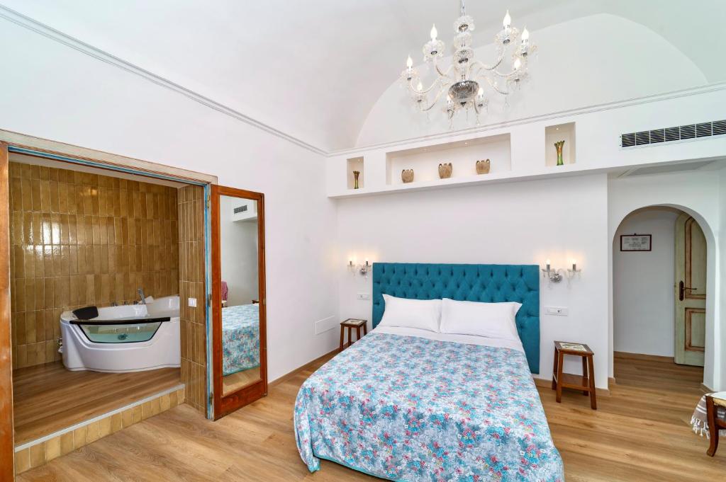 Postel nebo postele na pokoji v ubytování Casa Cosenza