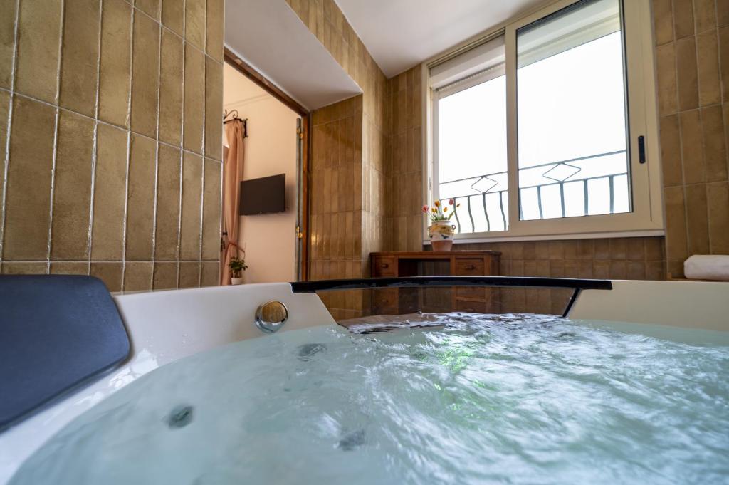 TV a/nebo společenská místnost v ubytování Casa Cosenza