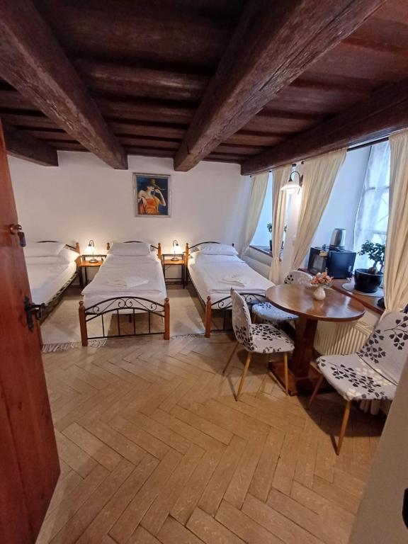 Postel nebo postele na pokoji v ubytování Pension Nina