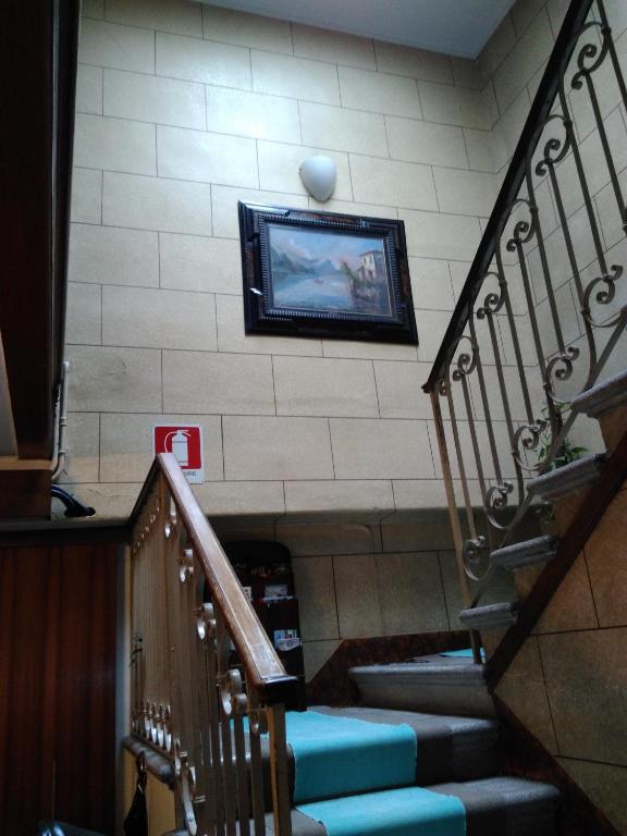 TV a/nebo společenská místnost v ubytování Albergo Al Gobbo
