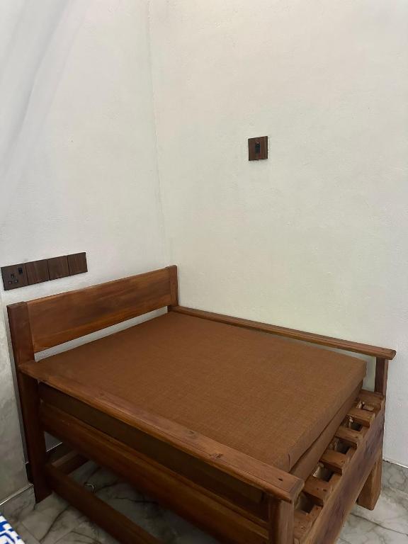 Postel nebo postele na pokoji v ubytování Rivinu Place Arugambay