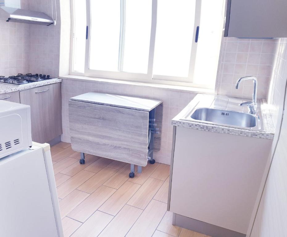 Kuchyň nebo kuchyňský kout v ubytování A Casa Di Alice