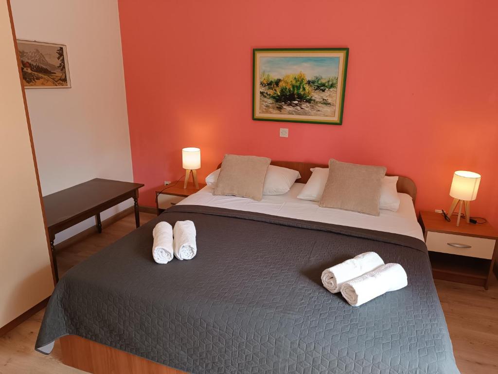 Posteľ alebo postele v izbe v ubytovaní Apartments Mirjana Baška
