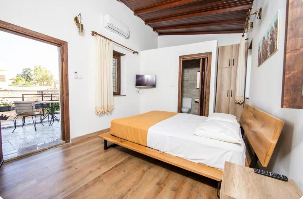 Postel nebo postele na pokoji v ubytování Caterina Cornaro House