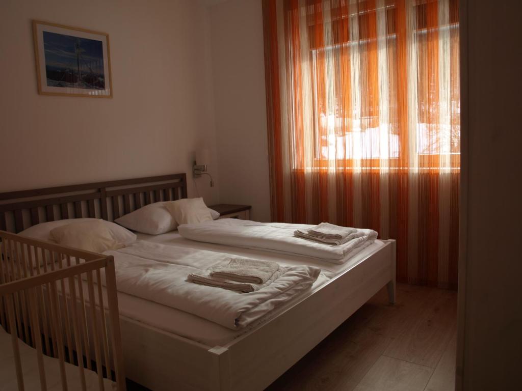 Postel nebo postele na pokoji v ubytování Haus Royal