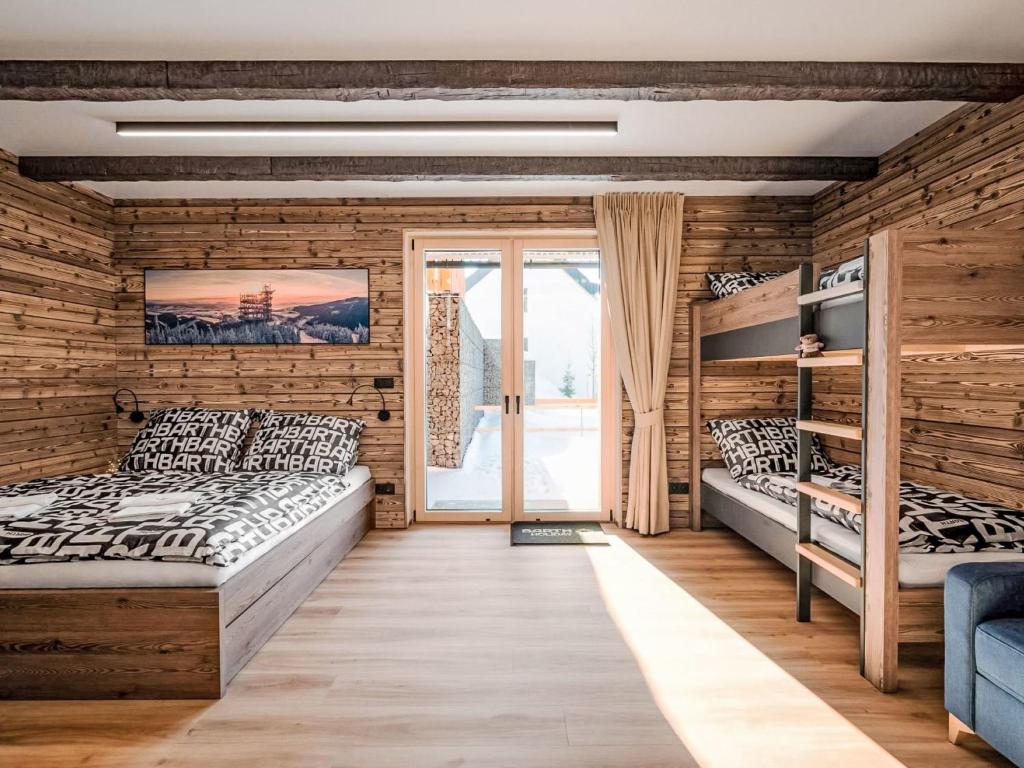 Ένα ή περισσότερα κρεβάτια σε δωμάτιο στο Apartment Dolní Morava-1 by Interhome