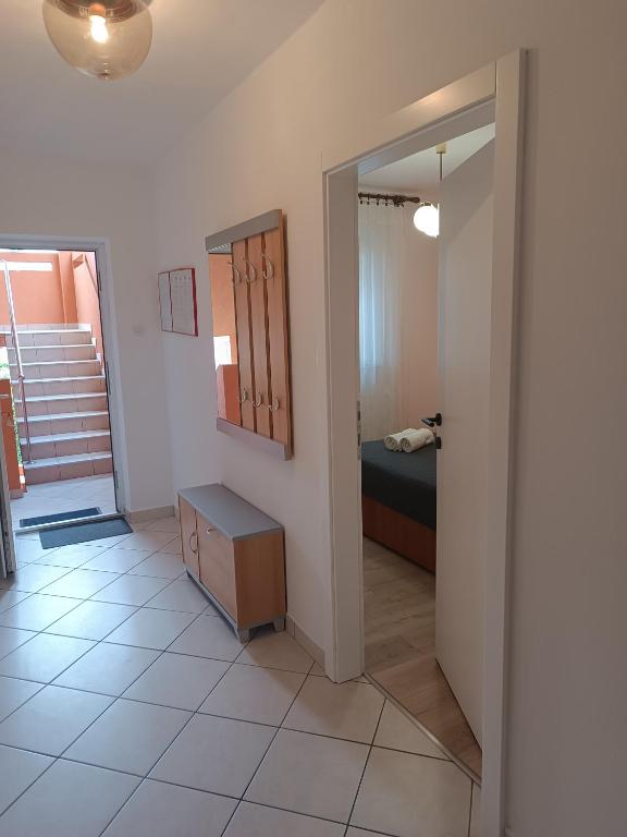Posteľ alebo postele v izbe v ubytovaní Apartments Mirjana Baška