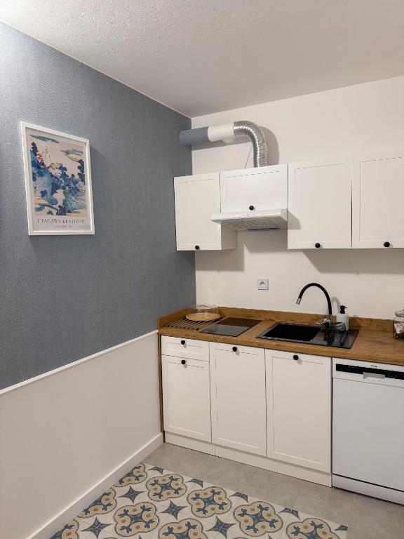 Kuchyňa alebo kuchynka v ubytovaní Apartament Ósemka