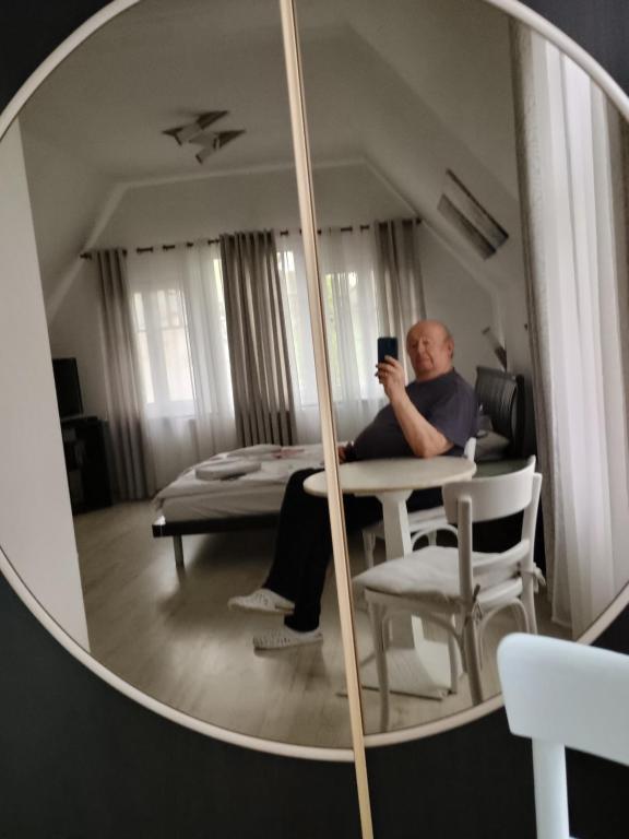 Posteľ alebo postele v izbe v ubytovaní Biały apartament