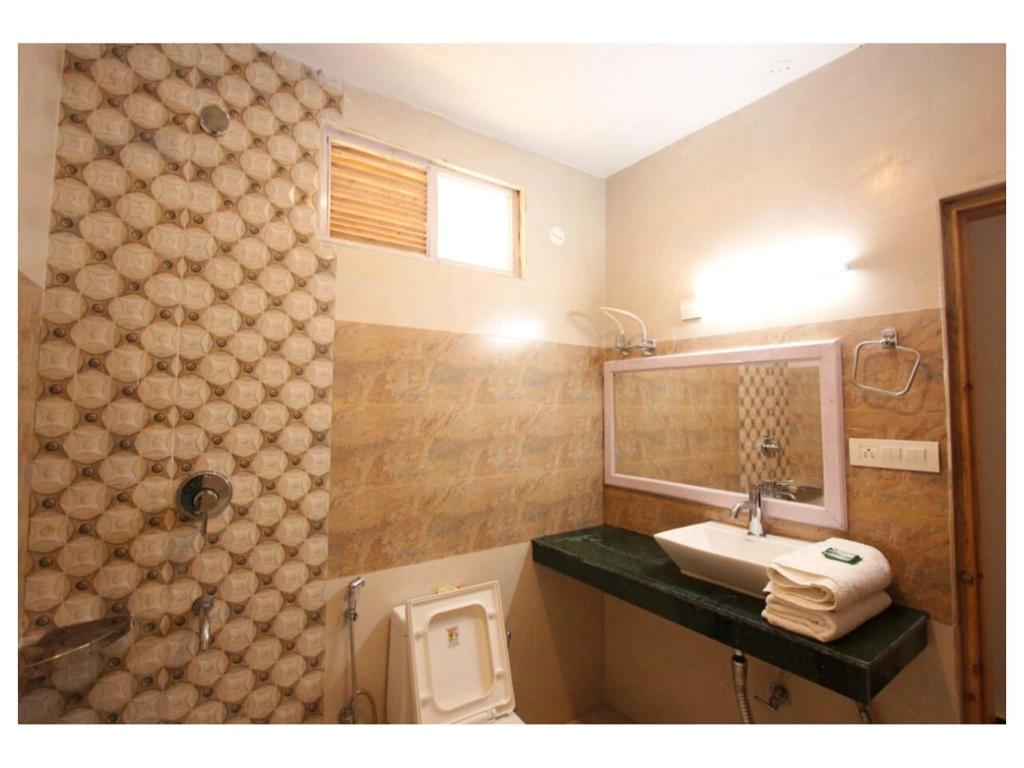 Koupelna v ubytování Hotel Saras Manali