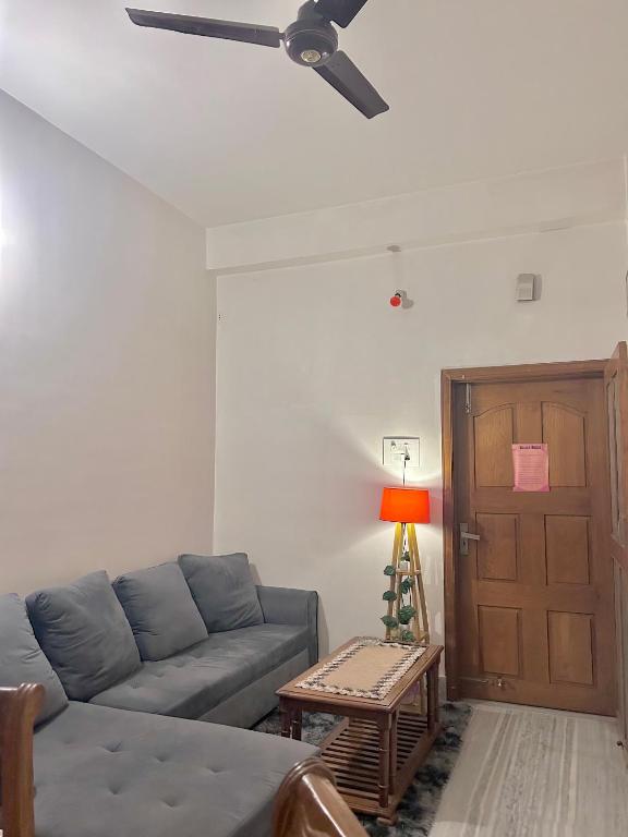 Posezení v ubytování Riverside Homestay