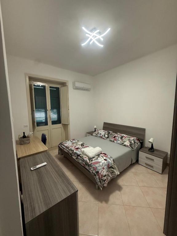 Postel nebo postele na pokoji v ubytování CasadiLollo