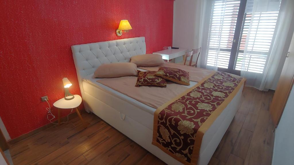 Postel nebo postele na pokoji v ubytování Villa Senegačnik