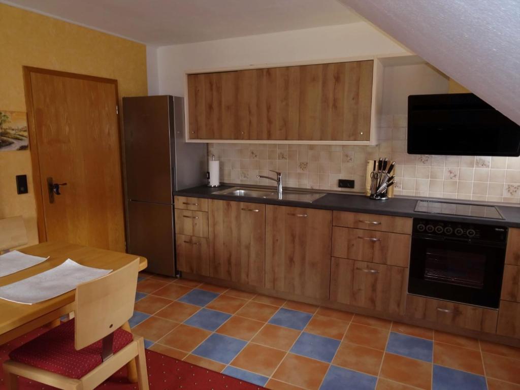 Kuchyň nebo kuchyňský kout v ubytování Ferienwohnung Mühlengrün