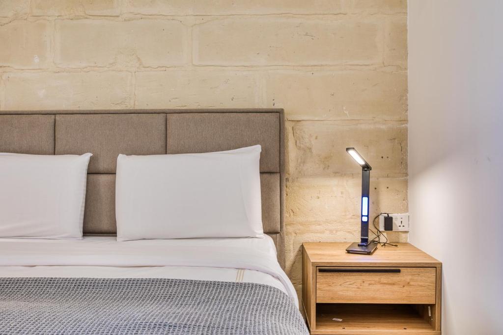 Postel nebo postele na pokoji v ubytování Melita Breeze House