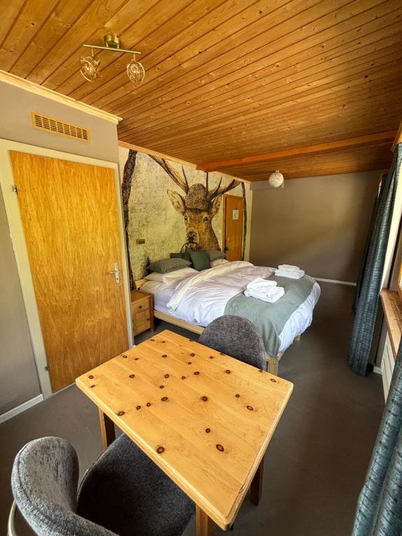 Postel nebo postele na pokoji v ubytování Familiehotel La Randulina
