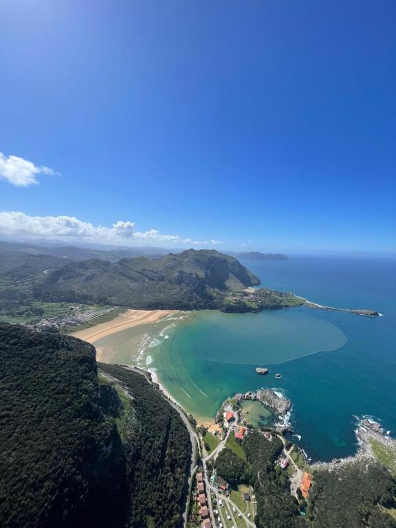 an aerial view of a beach and the ocean at Verde & Mar in Castro-Urdiales