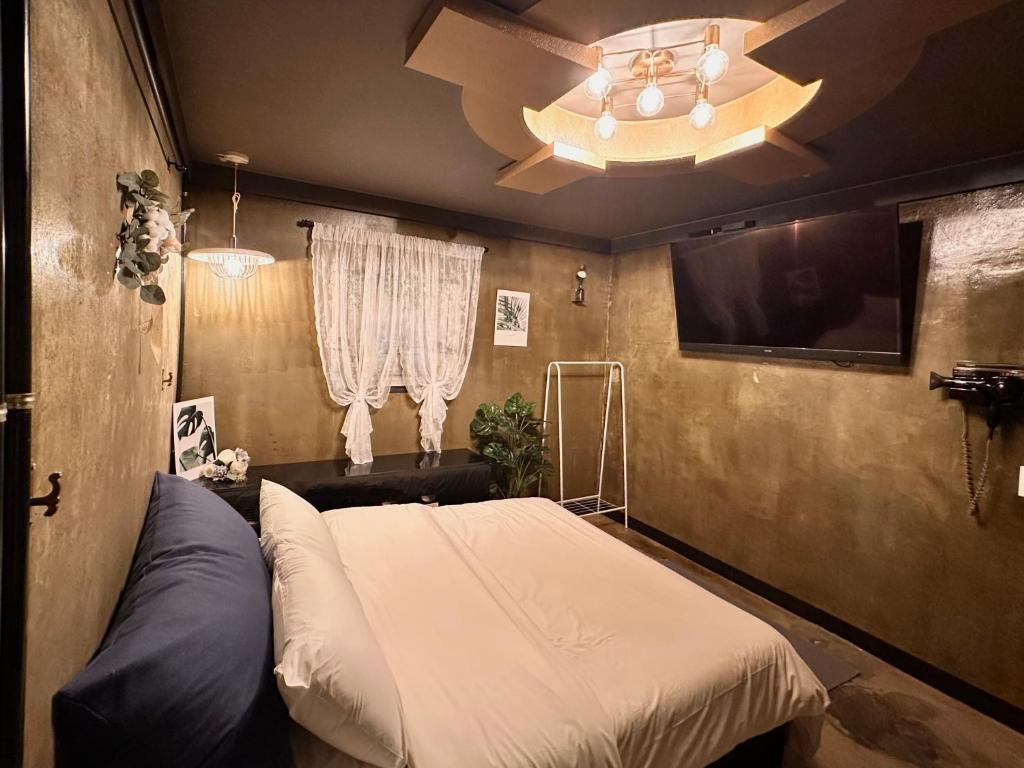 Postel nebo postele na pokoji v ubytování Stay Cozy 스테이 하우스