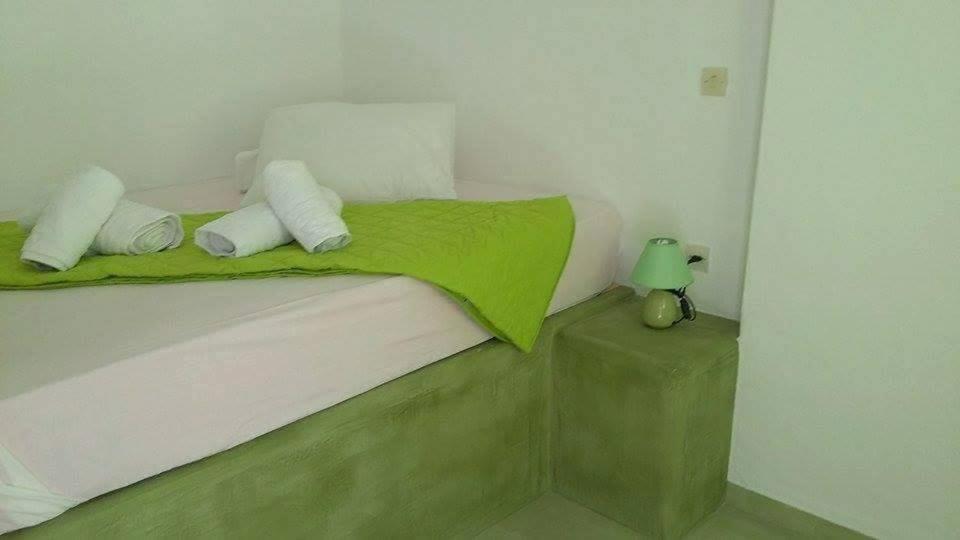 A bed or beds in a room at Pension Christina