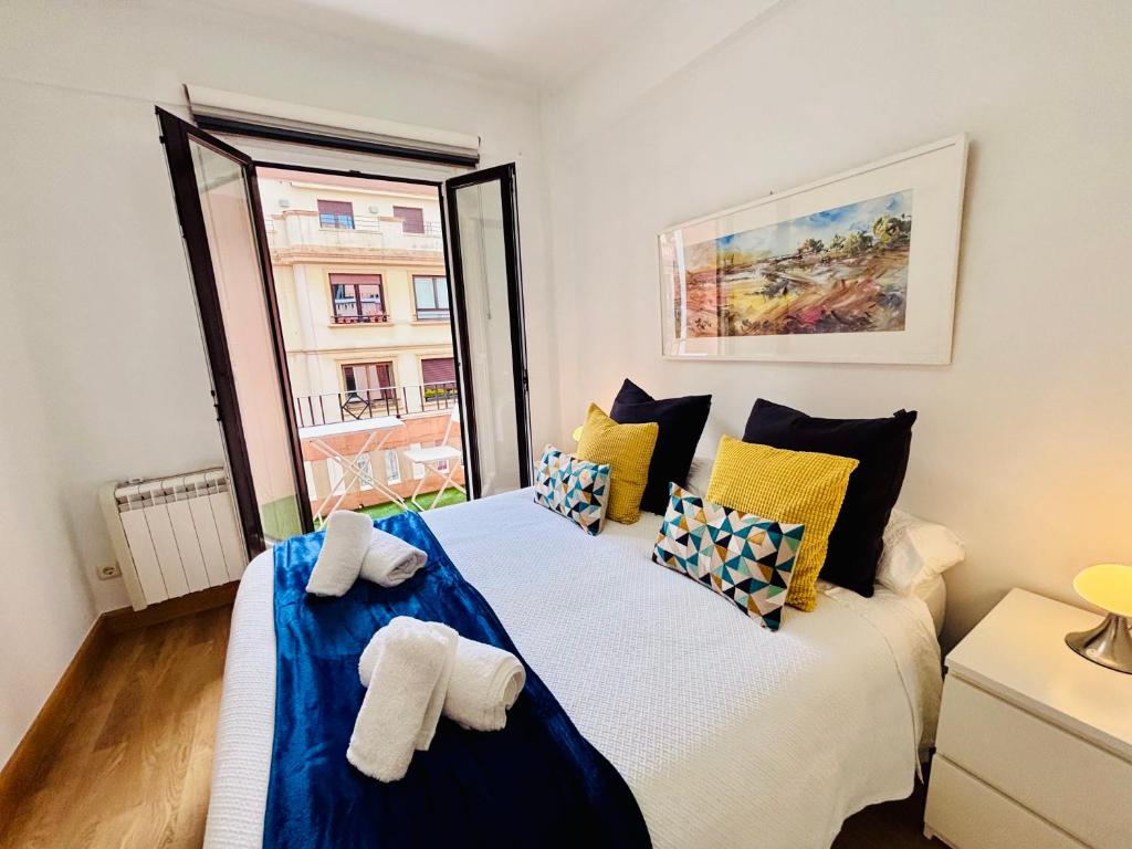 Ένα ή περισσότερα κρεβάτια σε δωμάτιο στο Apartamento Coqueto en Gros