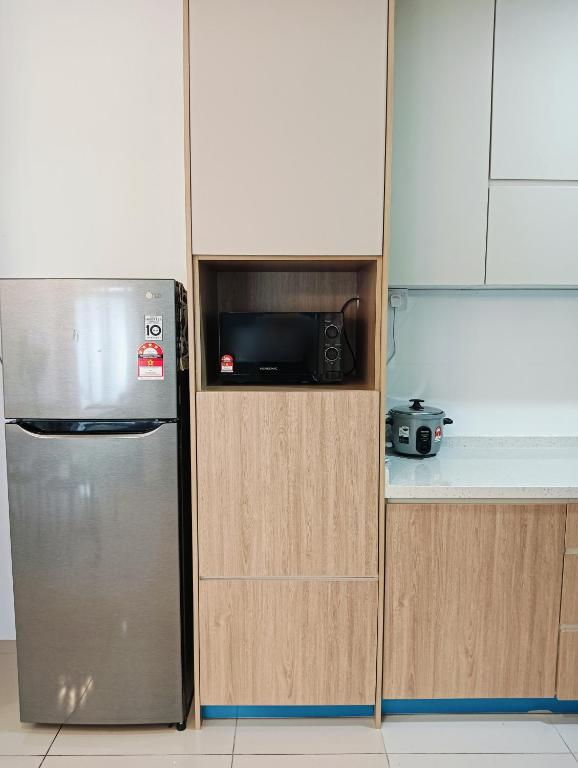 Kuchyň nebo kuchyňský kout v ubytování Mslim Friendly Stay at Bayu Aisyah Putrajaya, Presint 11
