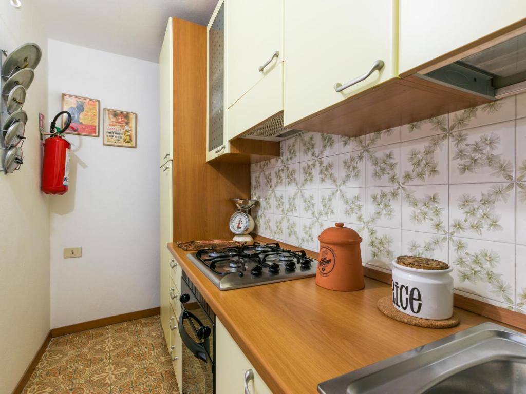 Kuchyň nebo kuchyňský kout v ubytování Apartment 81 Passi by Interhome