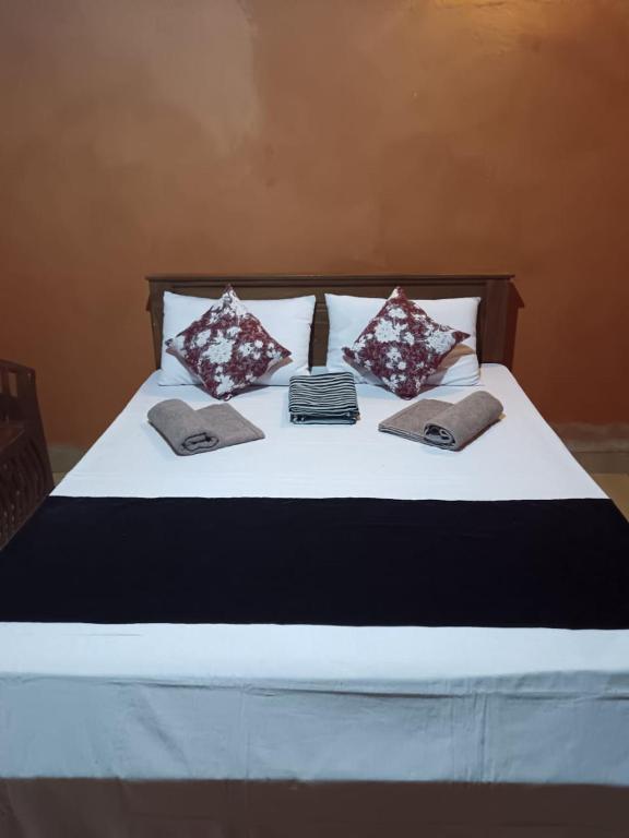 Postel nebo postele na pokoji v ubytování කැලෑව Jungle Eco Resort