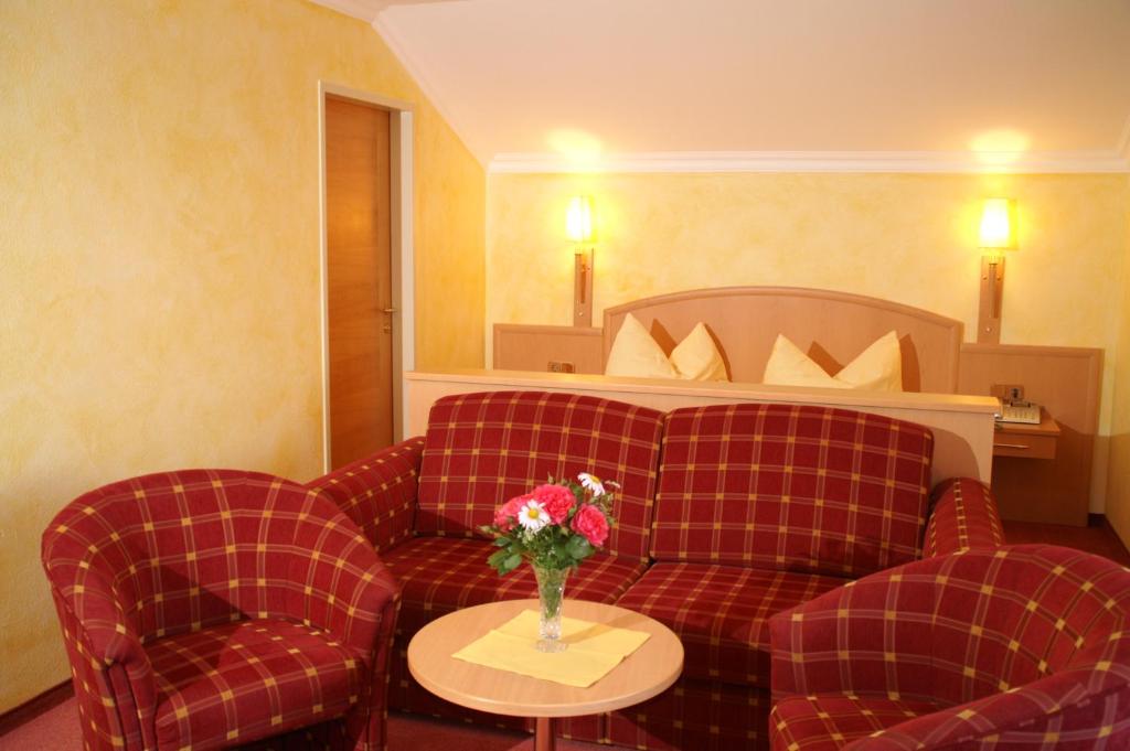 Postel nebo postele na pokoji v ubytování Ferienhotel Hofer superior