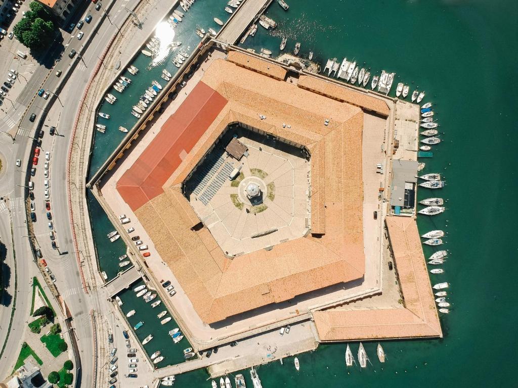 an overhead view of a building in the water at VVR6 Apartment by Homes in Ancona in Ancona