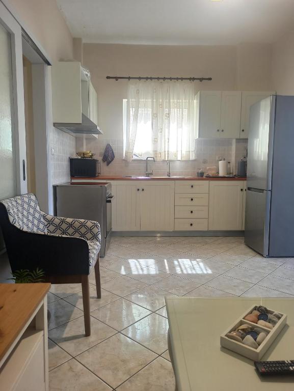 Kuchyň nebo kuchyňský kout v ubytování Panos Apartment