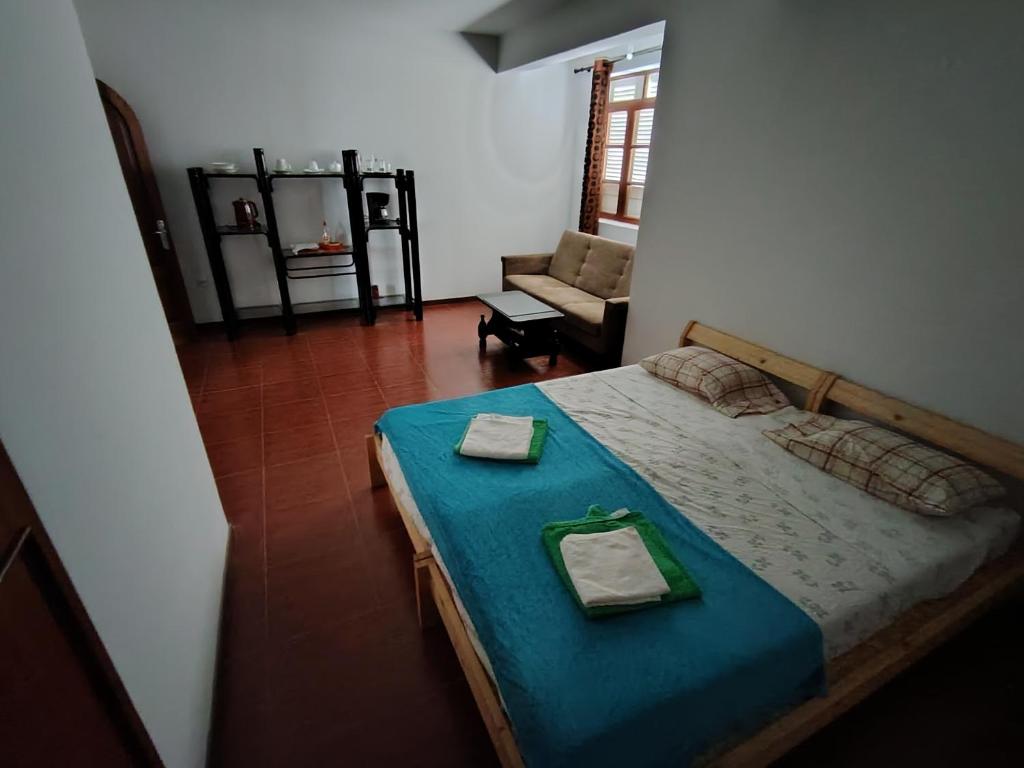 Llit o llits en una habitació de Maya Mindelo 4