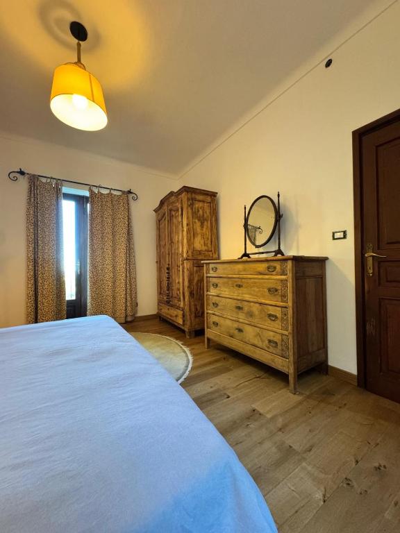 Postel nebo postele na pokoji v ubytování Al Riccio