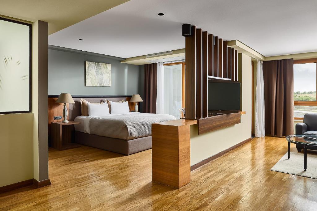 Postel nebo postele na pokoji v ubytování Park Hotel & Spa