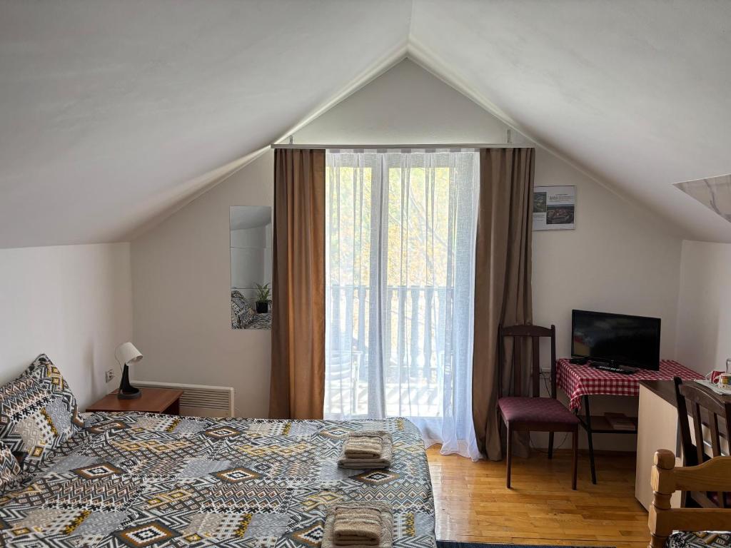 Postel nebo postele na pokoji v ubytování Lola