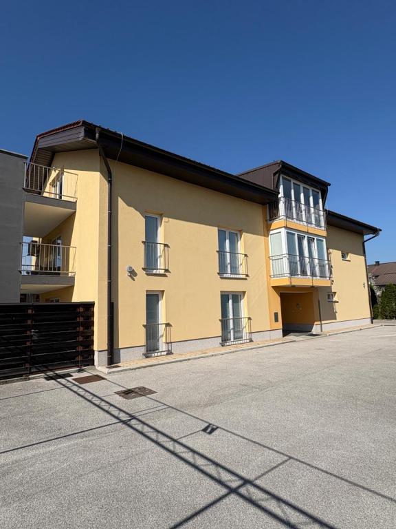 an empty parking lot in front of a building at Apartma Moravske Toplice 6 in Moravske Toplice