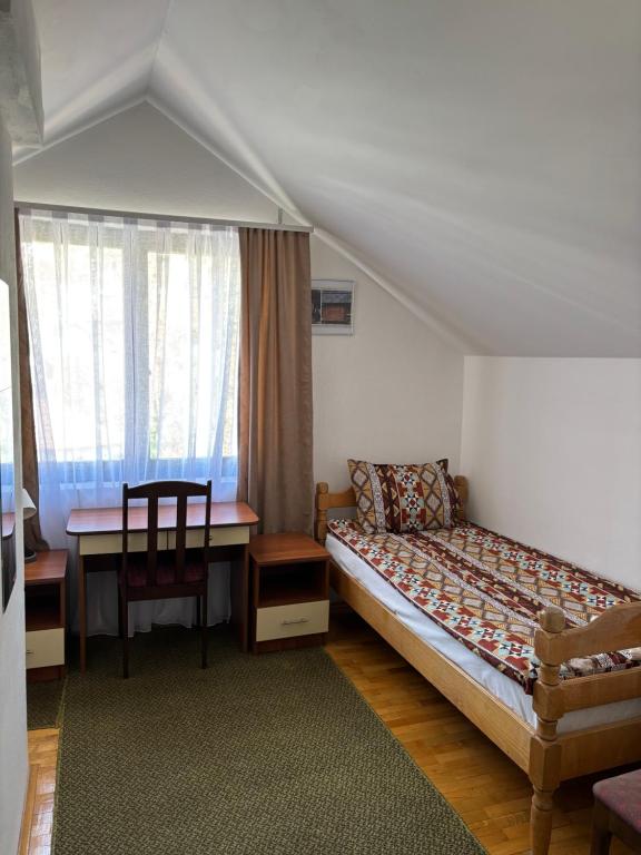 Postel nebo postele na pokoji v ubytování Lola